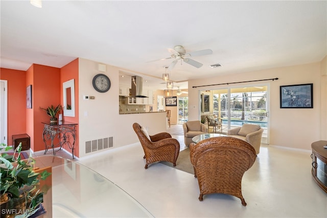 living room featuring ceiling fan