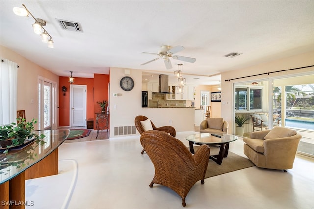 living room with ceiling fan