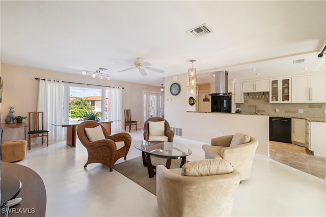 living room featuring ceiling fan