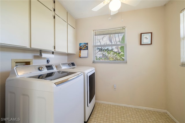 clothes washing area featuring separate washer and dryer, cabinets, and ceiling fan