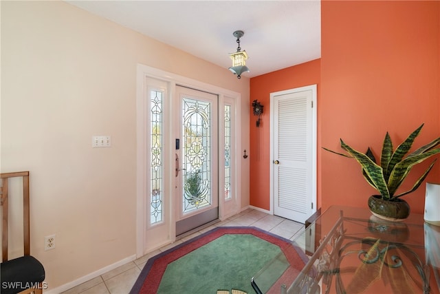 entrance foyer featuring light tile patterned floors