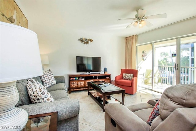 living room featuring ceiling fan and light tile patterned flooring