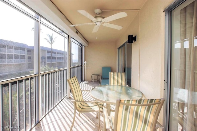 sunroom / solarium with ceiling fan