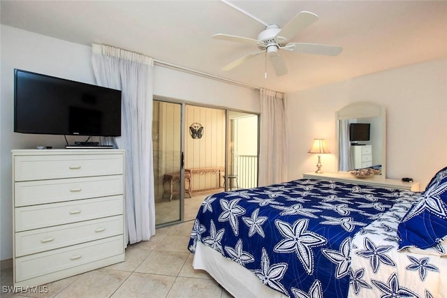 bedroom with ceiling fan, a closet, and light tile patterned floors