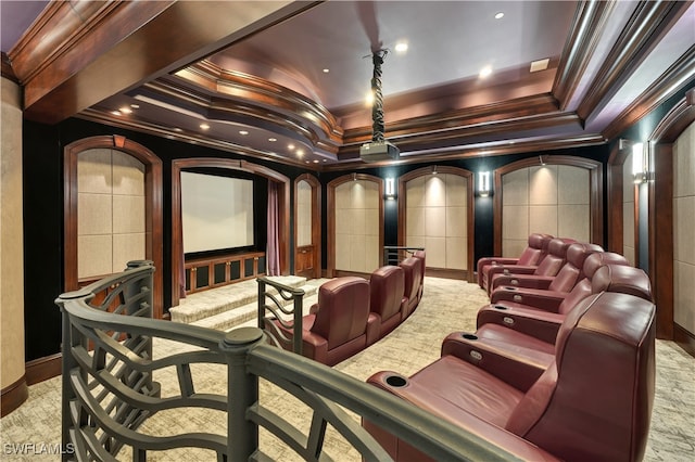 carpeted home theater room with ornamental molding