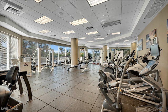 workout area featuring a drop ceiling