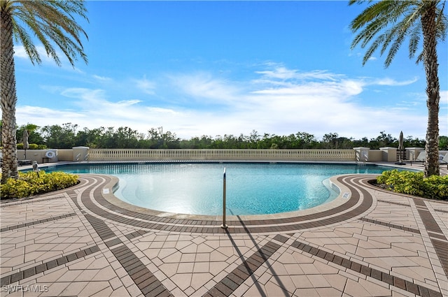 view of pool with a patio area