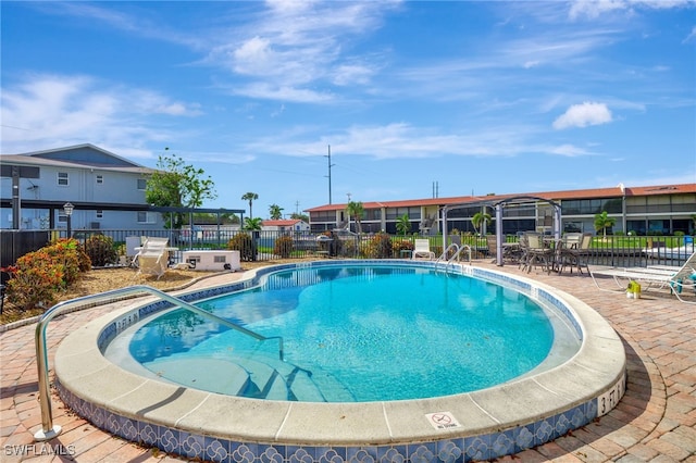 view of pool with a patio