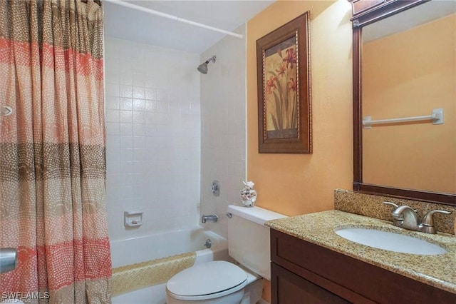 full bathroom with vanity, toilet, and shower / tub combo