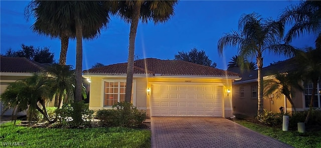 view of front of property with a garage