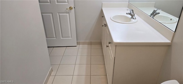 bathroom with vanity and tile patterned floors