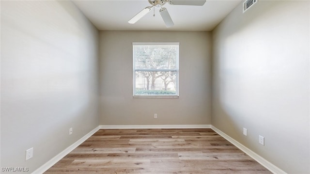 unfurnished room with light hardwood / wood-style flooring and ceiling fan