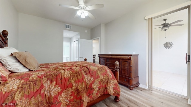 bedroom featuring ceiling fan and light hardwood / wood-style flooring