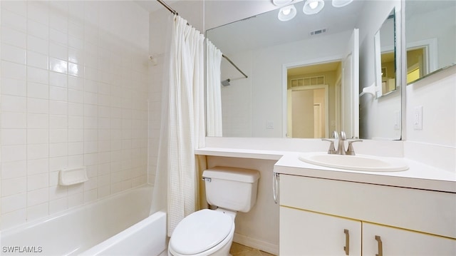 full bathroom with vanity, shower / bath combination with curtain, and toilet