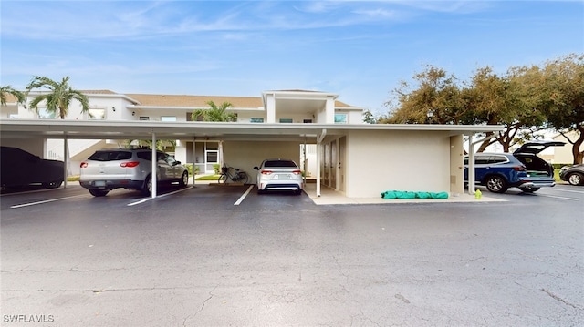 view of parking featuring a carport