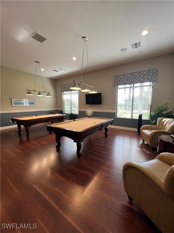 recreation room with hardwood / wood-style flooring, billiards, and a healthy amount of sunlight