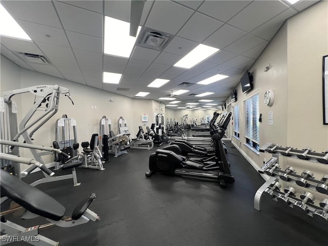 workout area with a drop ceiling