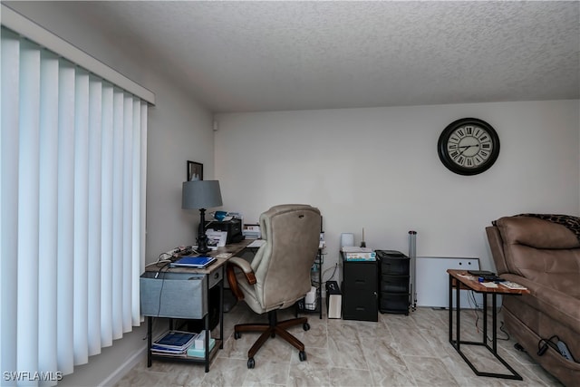 office featuring a textured ceiling