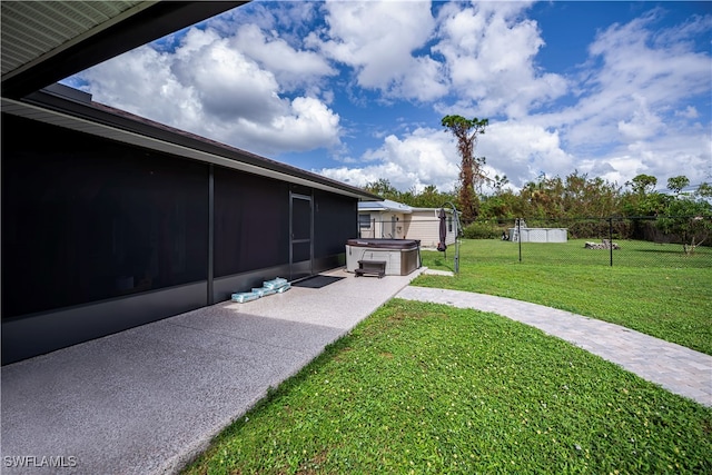 view of yard with a hot tub