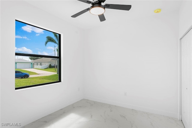 empty room featuring ceiling fan