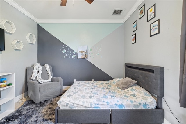 bedroom with ornamental molding and ceiling fan