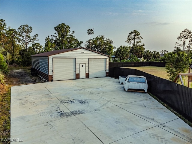 garage with a lawn