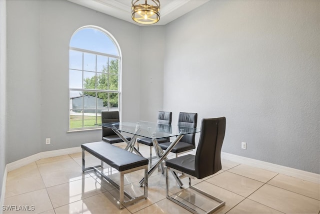 dining area featuring plenty of natural light and light tile patterned floors