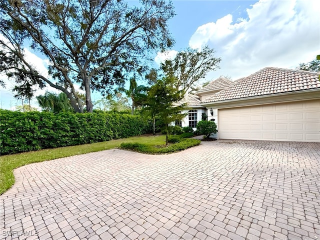 view of front of home featuring a garage