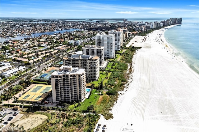 bird's eye view with a view of the beach and a water view