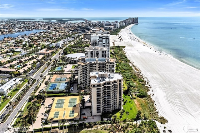 bird's eye view with a beach view and a water view