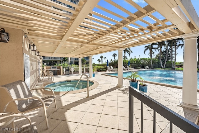 view of swimming pool with a community hot tub, a pergola, and a patio area