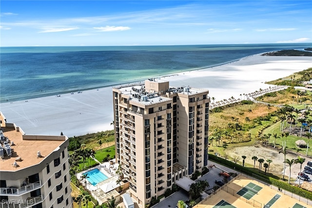 aerial view with a beach view and a water view