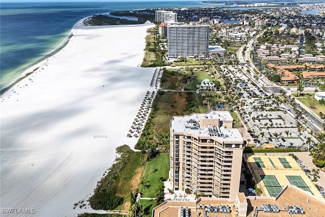 bird's eye view with a beach view and a water view