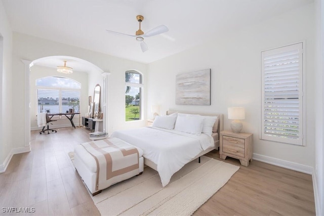 bedroom with light wood-type flooring and ceiling fan