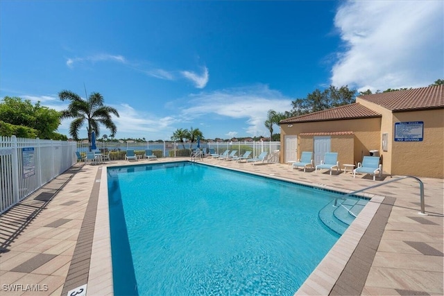 view of swimming pool featuring a patio