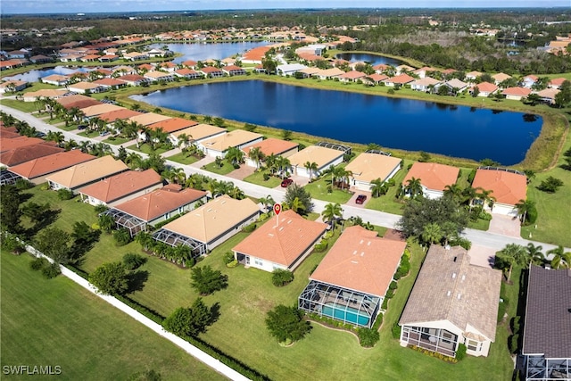 bird's eye view with a water view