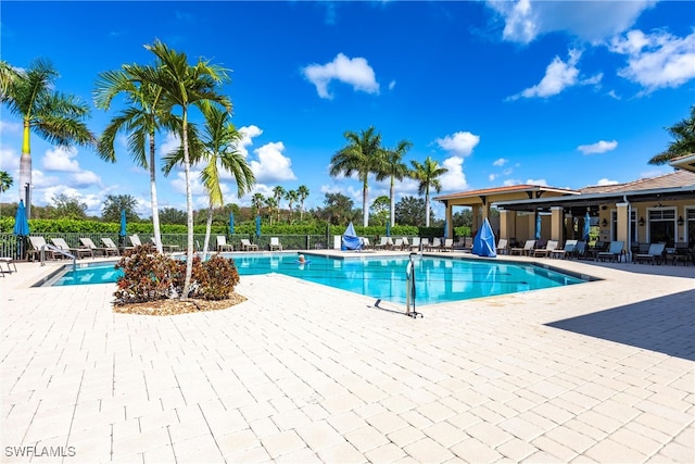 view of pool featuring a patio