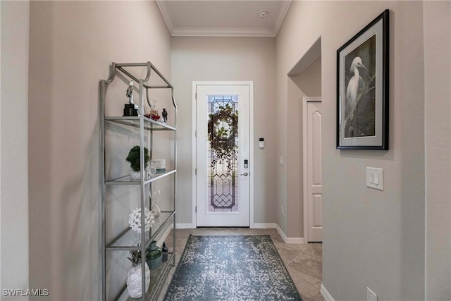 doorway with crown molding and baseboards