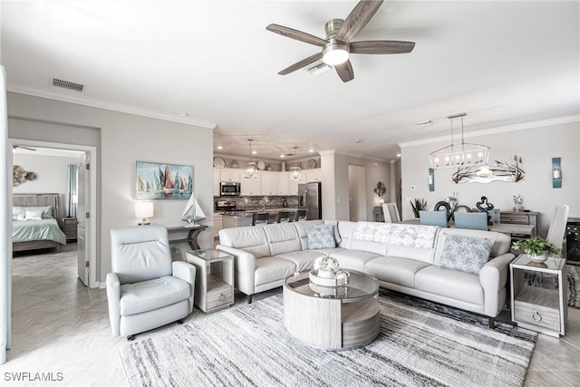 living area featuring visible vents, crown molding, and light tile patterned floors