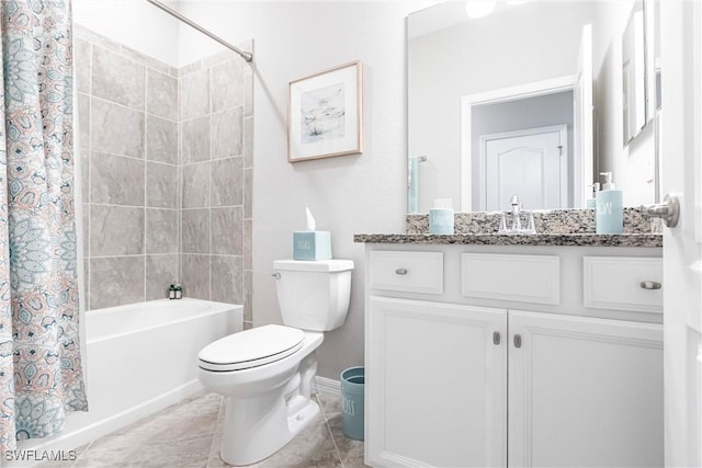 full bath with toilet, tile patterned flooring, shower / bath combo with shower curtain, and vanity