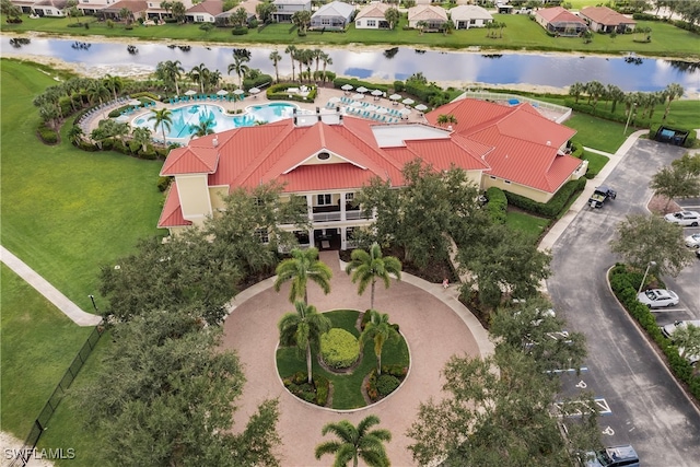 birds eye view of property featuring a water view