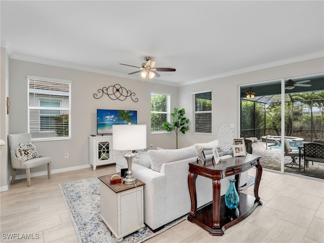 living room with a healthy amount of sunlight, ornamental molding, and light tile patterned floors