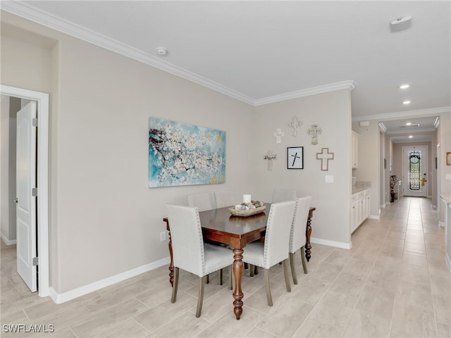 dining area with crown molding