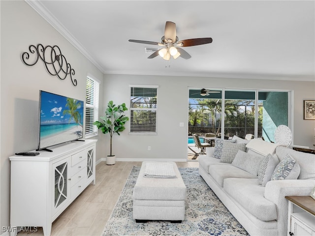 living room with ceiling fan, crown molding, and light hardwood / wood-style flooring