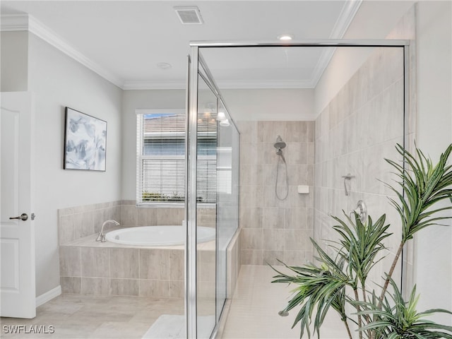 bathroom with crown molding and separate shower and tub