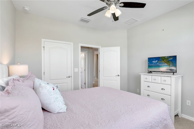 carpeted bedroom featuring ceiling fan