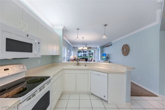 kitchen featuring kitchen peninsula, white appliances, white cabinets, and sink