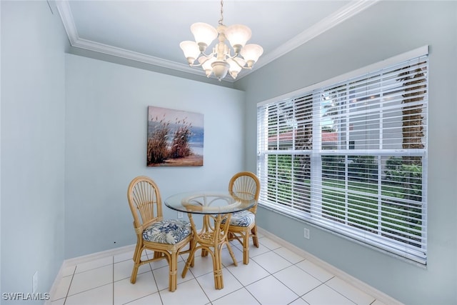 dining space with ornamental molding, a notable chandelier, and light tile patterned flooring