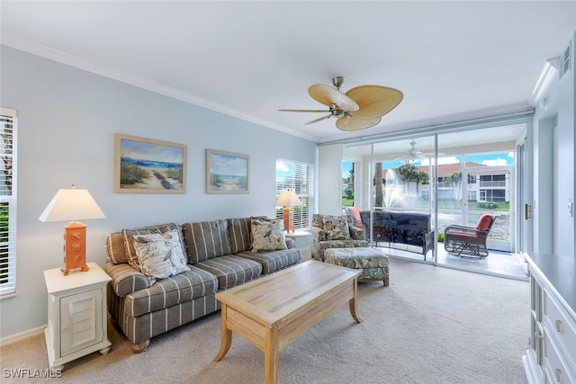 living room featuring light carpet and ornamental molding