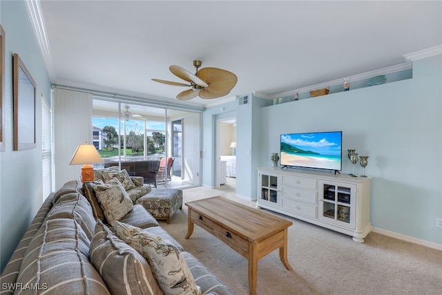 living room featuring light colored carpet, ceiling fan, and ornamental molding